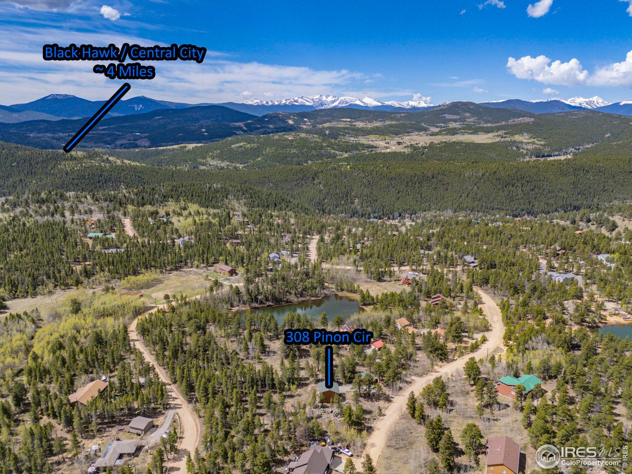 308 Pinon Circle Black Hawk, CO 80422 - Photo 35 of 37 a view of a lake with a mountain