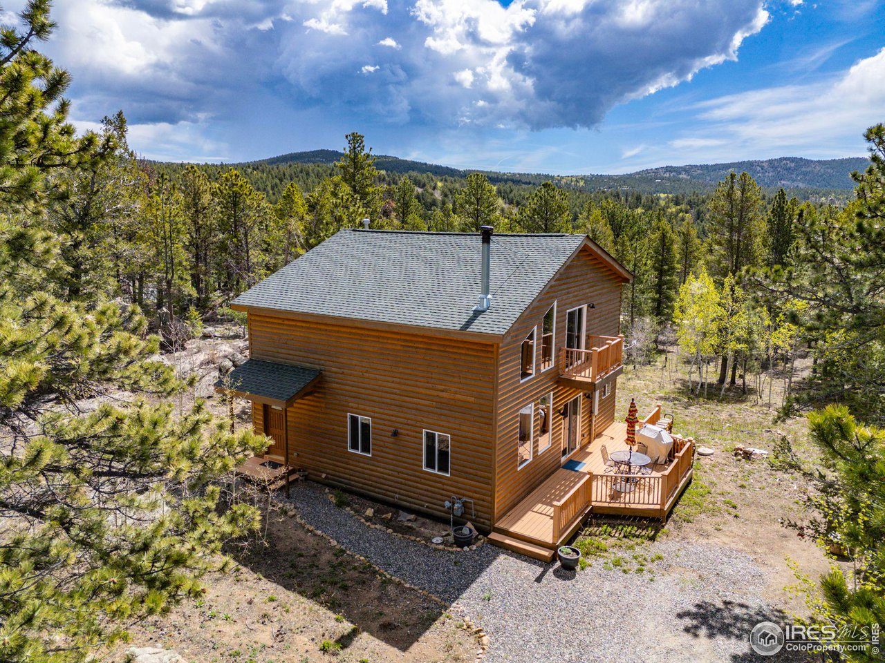 308 Pinon Circle Black Hawk, CO 80422 - Photo 4 of 37 a view of a house with a yard