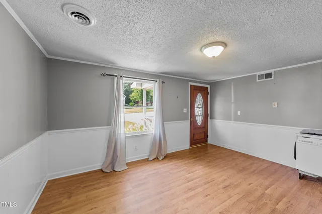 an empty room with windows