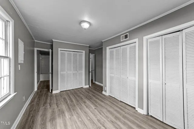 a view of entryway with wooden floor