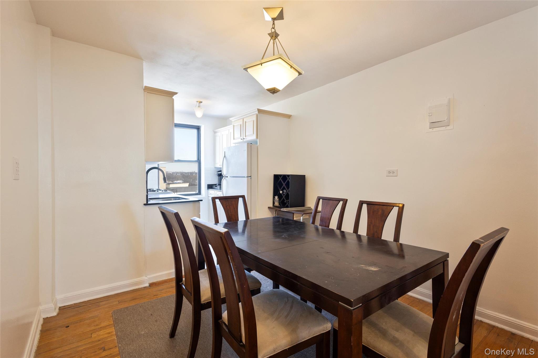 102-36 64th Avenue, Unit 6B Queens, NY 11375 - Photo 4 of 12 a view of a dining room with furniture