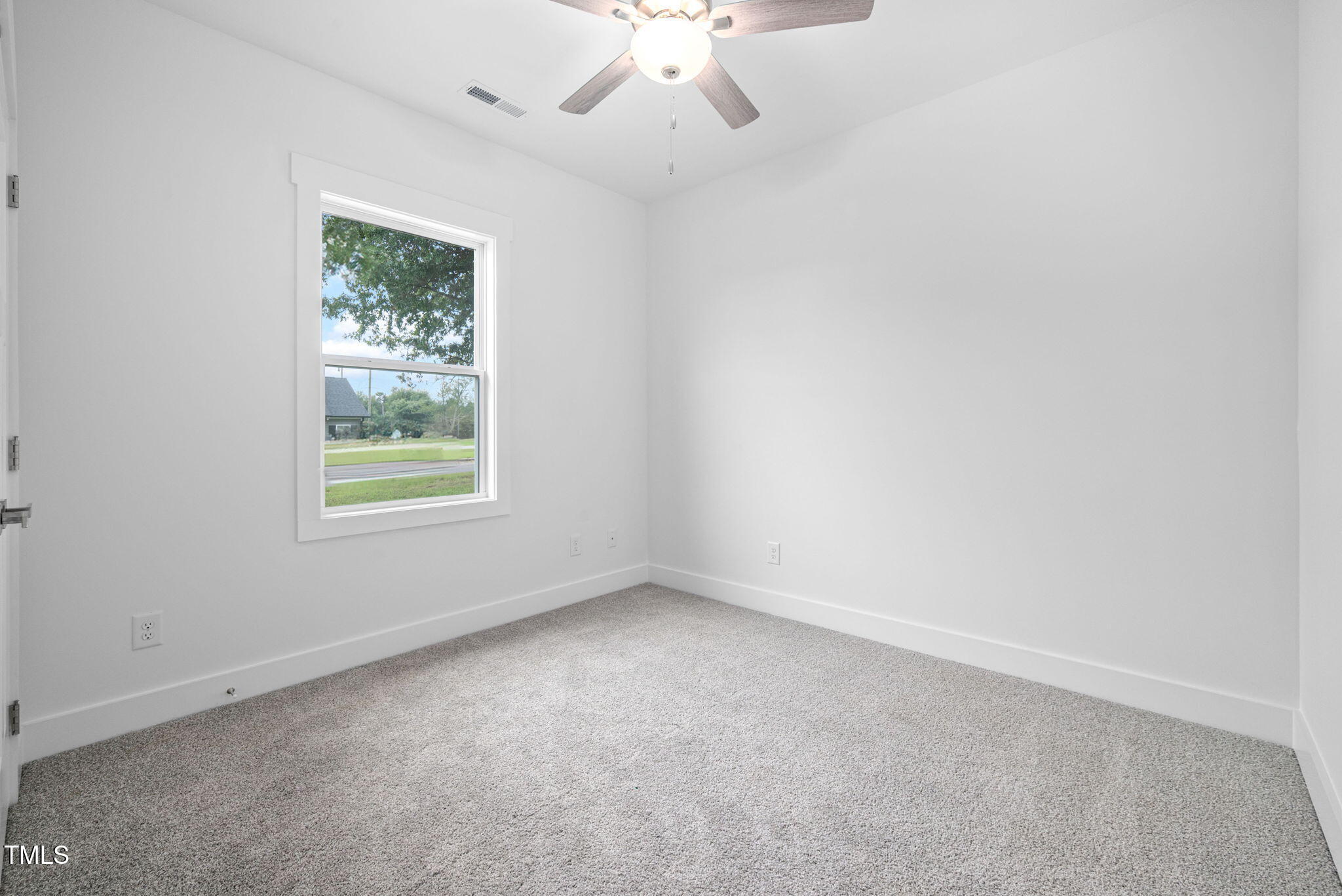 19 Southern Village Drive Roxboro, NC 27573 - Photo 14 of 31 an empty room with a window