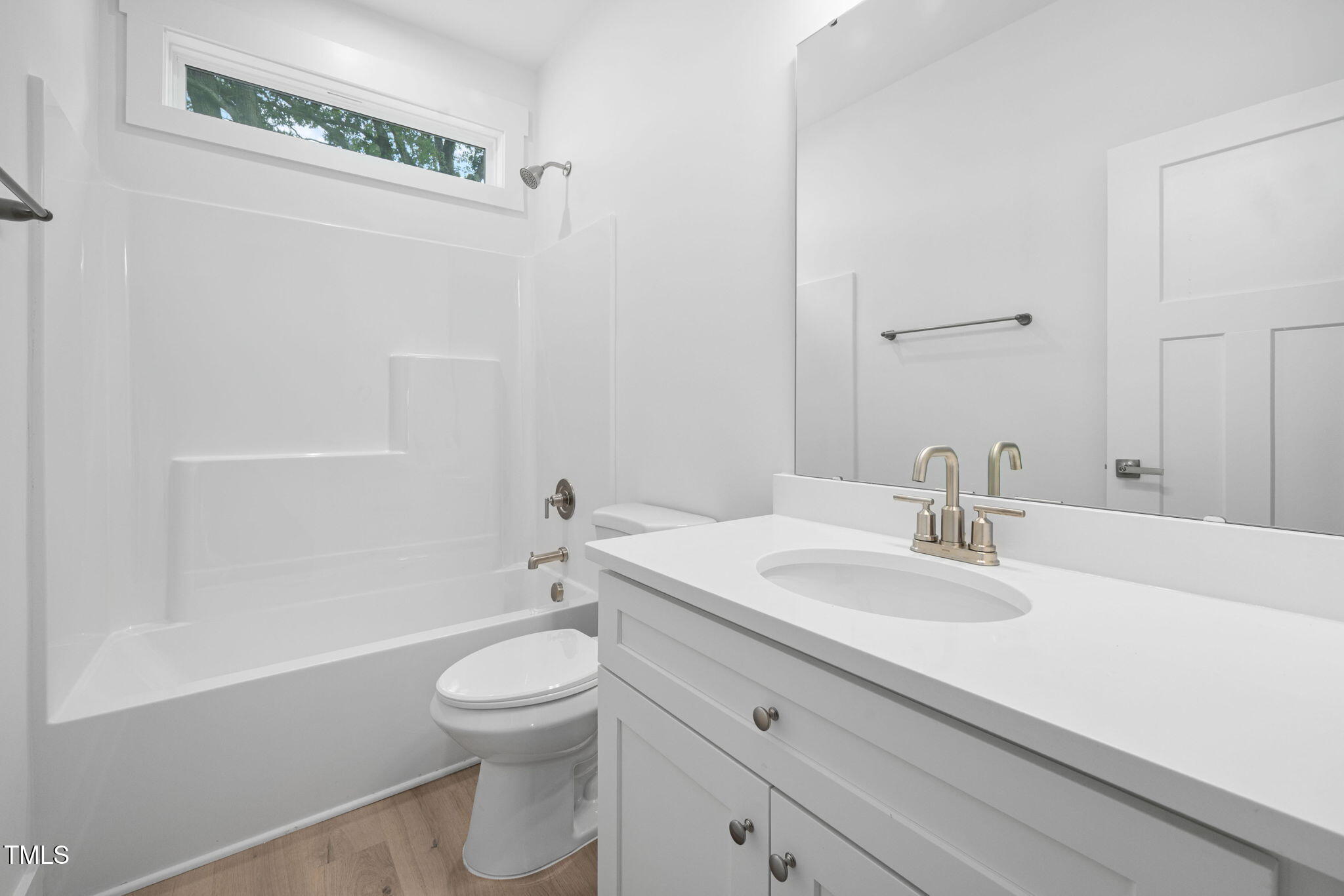 19 Southern Village Drive Roxboro, NC 27573 - Photo 16 of 31 a bathroom with a sink a toilet and shower