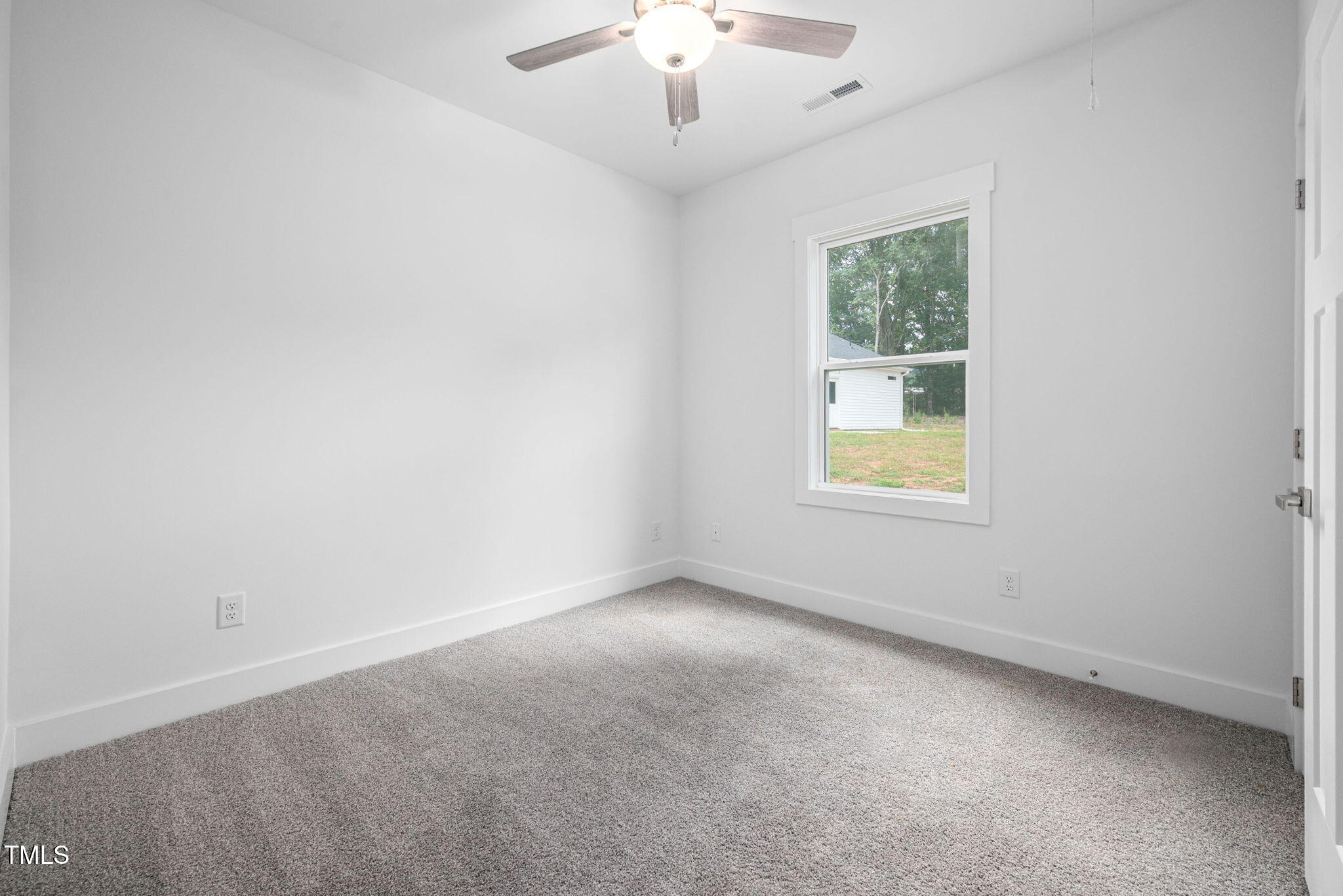 19 Southern Village Drive Roxboro, NC 27573 - Photo 19 of 31 an empty room with a window