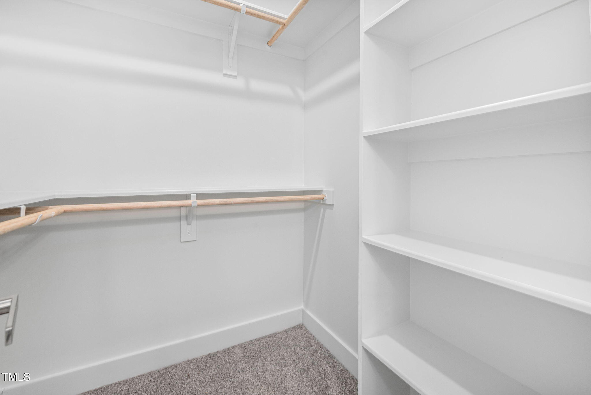 19 Southern Village Drive Roxboro, NC 27573 - Photo 22 of 31 a view of an empty walk in closet