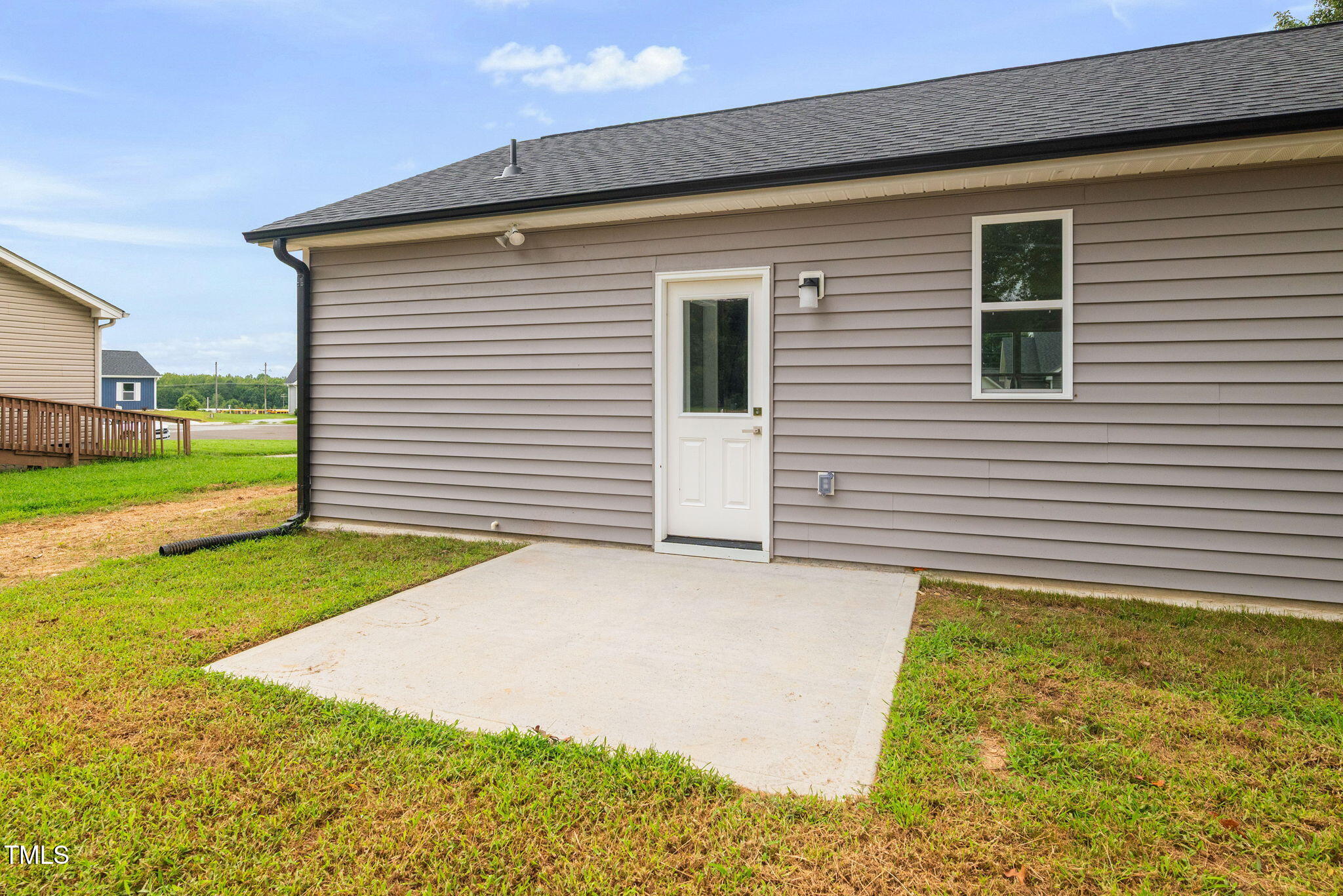 19 Southern Village Drive Roxboro, NC 27573 - Photo 28 of 31 a front view of a house with a yard and garage
