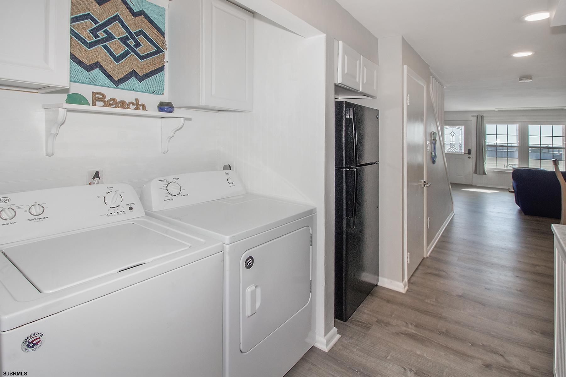 1101 East Brigantine Avenue, Unit 2 Brigantine, NJ 08203 - Photo 6 of 13 a view of utility room with washer and dryer