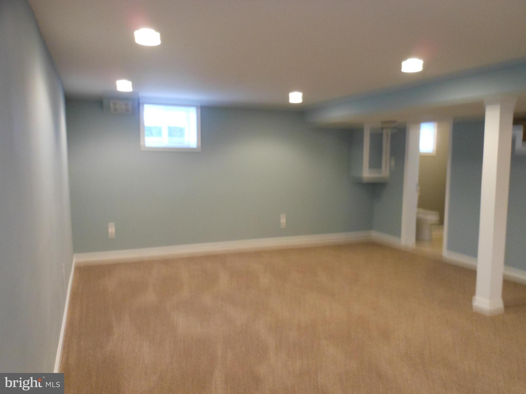 7302 Dooman Road Baltimore, MD 21244 - Photo 22 of 29 an empty room with windows