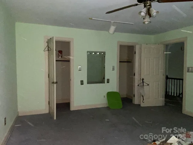 an empty room with windows