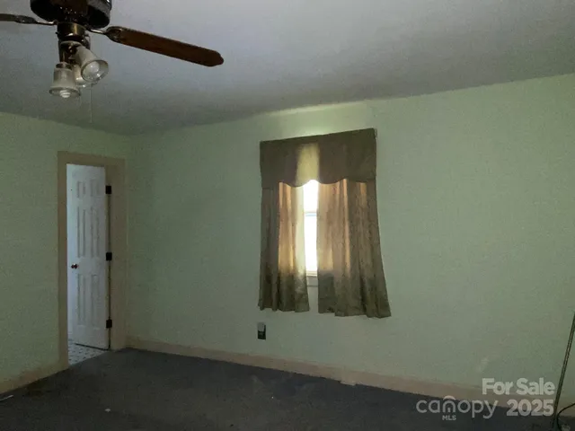 a view of a hallway with entryway