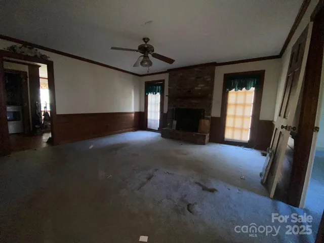 a view of a livingroom with a fireplace