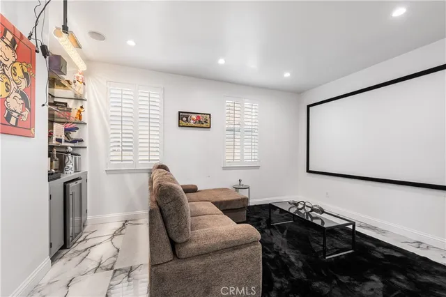 a living room with furniture and a couch