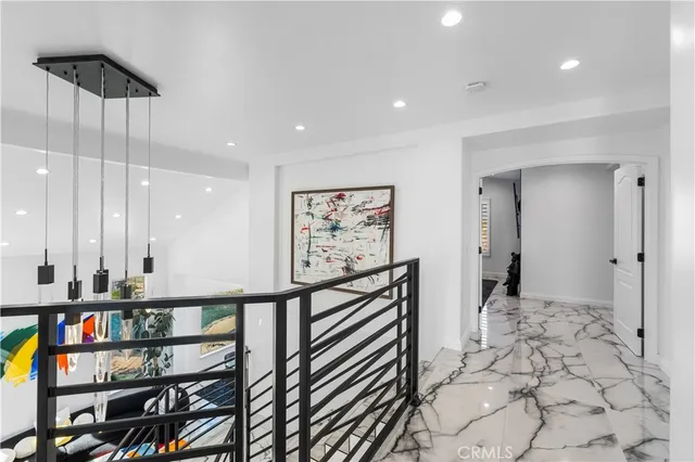 a spacious bedroom with a bed and window