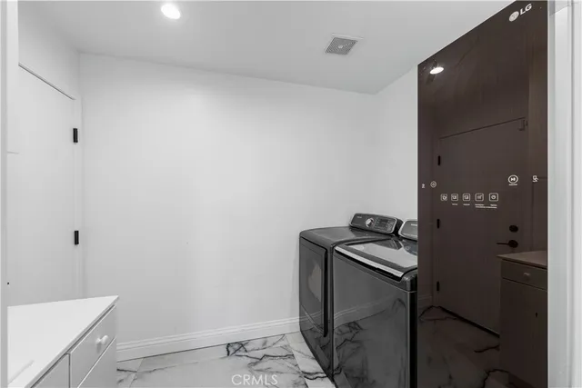 a view of a swimming pool with a yard