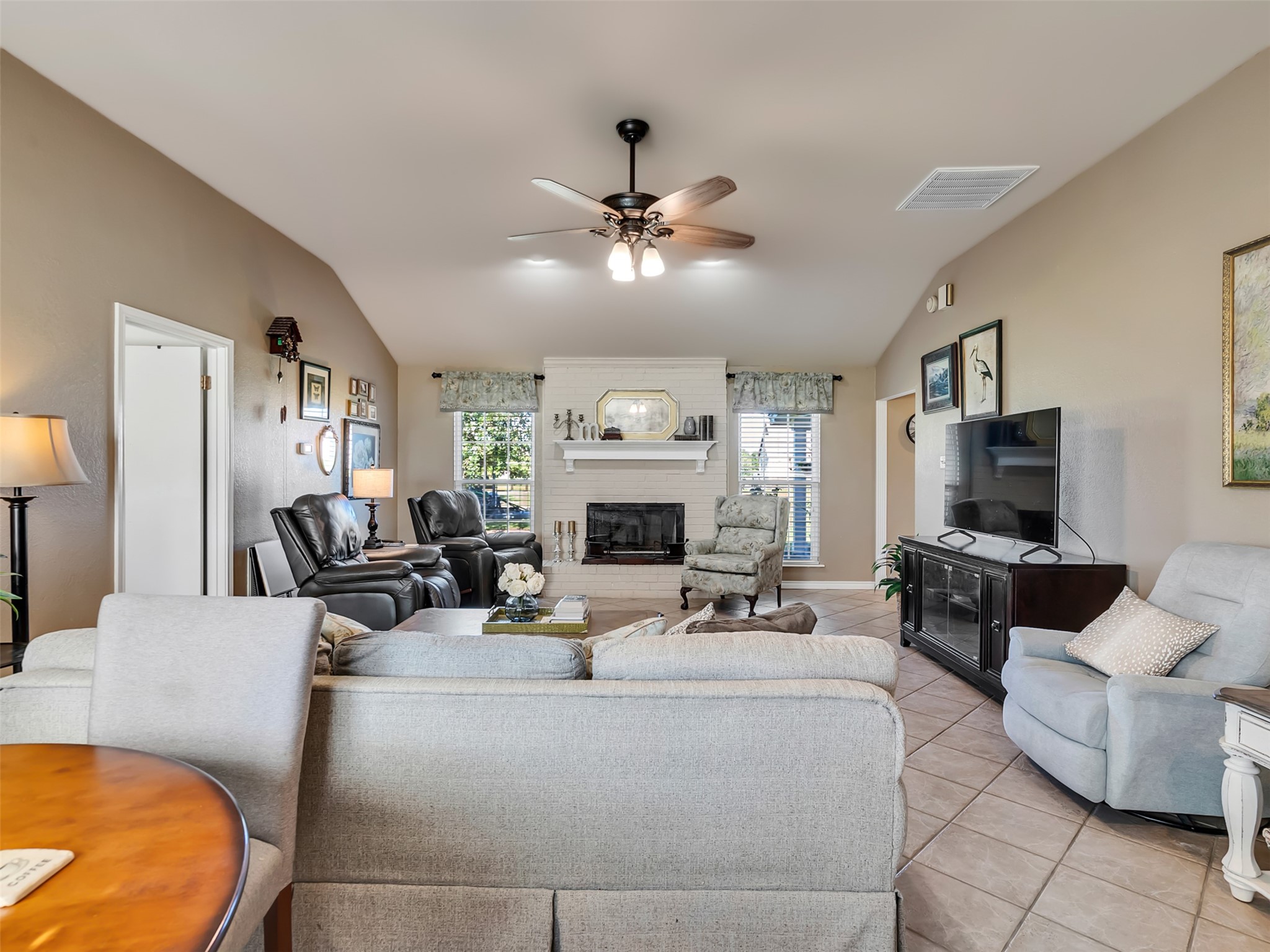 This cozy living room is the perfect place to gather. Comfortable, practical, and made for country living.