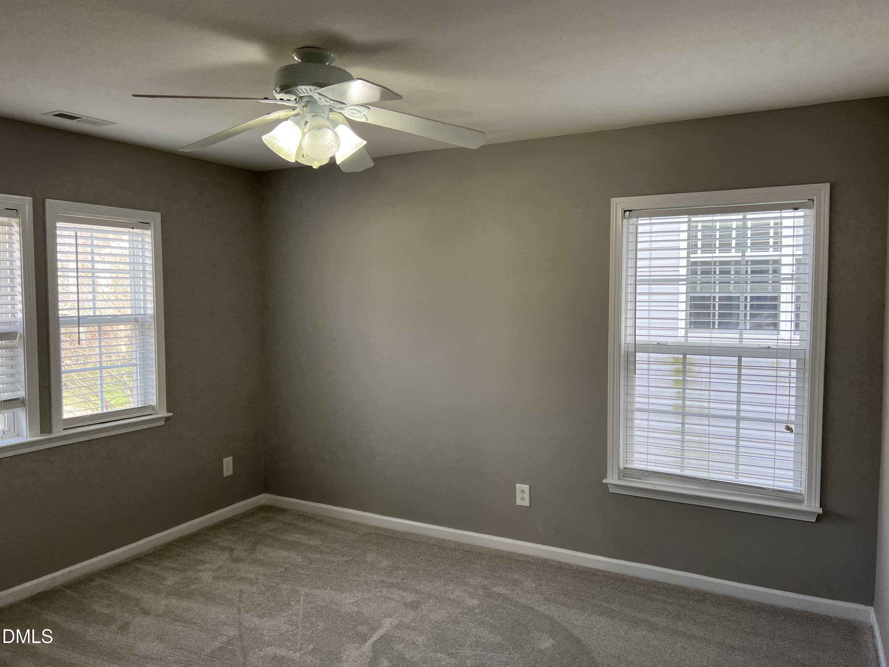 527 Emerald Downs Road Cary, NC 27519 - Photo 11 of 12 an empty room with a window