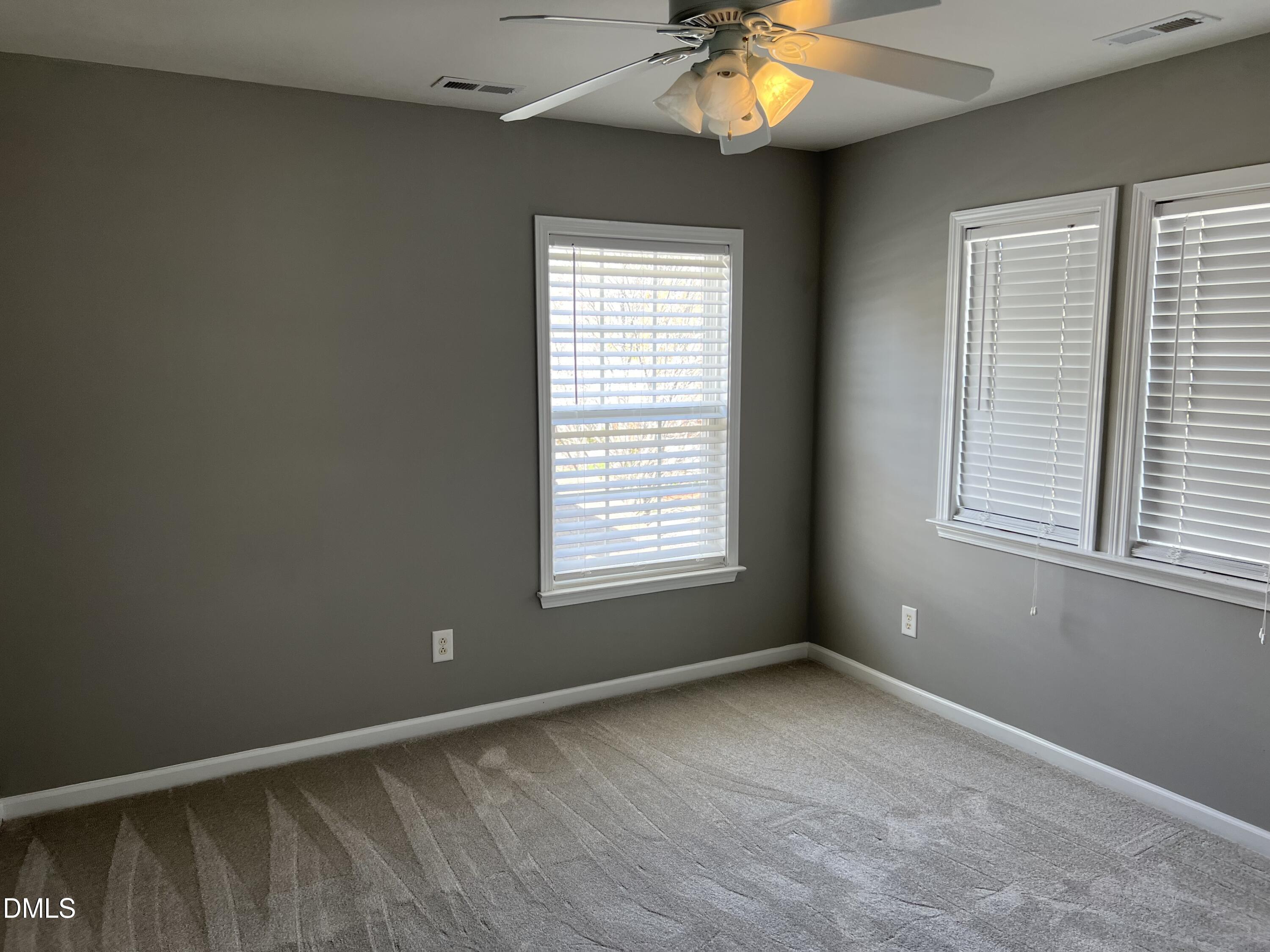 527 Emerald Downs Road Cary, NC 27519 - Photo 12 of 12 a view of an empty room with a window