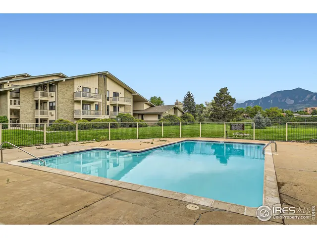 a view of a house with a swimming pool