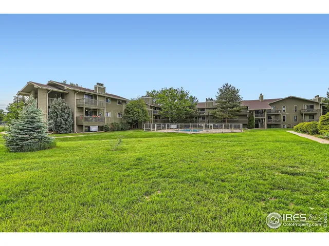 a view of a house with a big yard