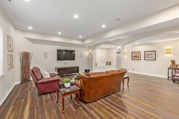 a living room with furniture window and a table
