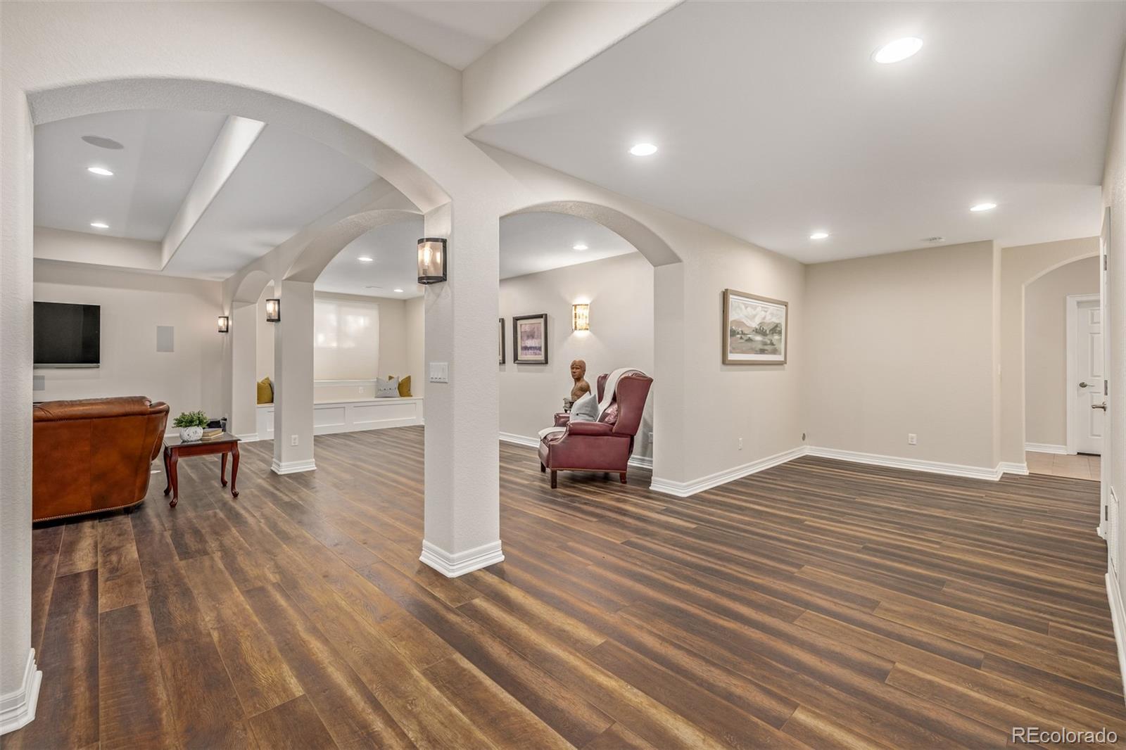 20166 East Shady Ridge Road Parker, CO 80134 - Photo 36 of 50 a view of a living room and dining room