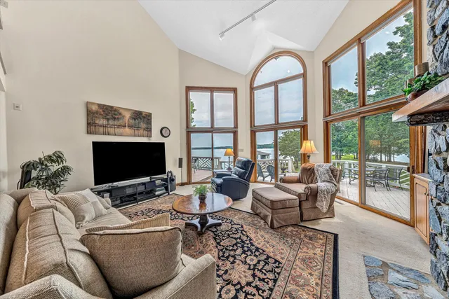 a view of a dining room with furniture and window