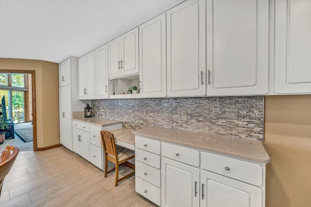 a bathroom with a sink a mirror and a toilet