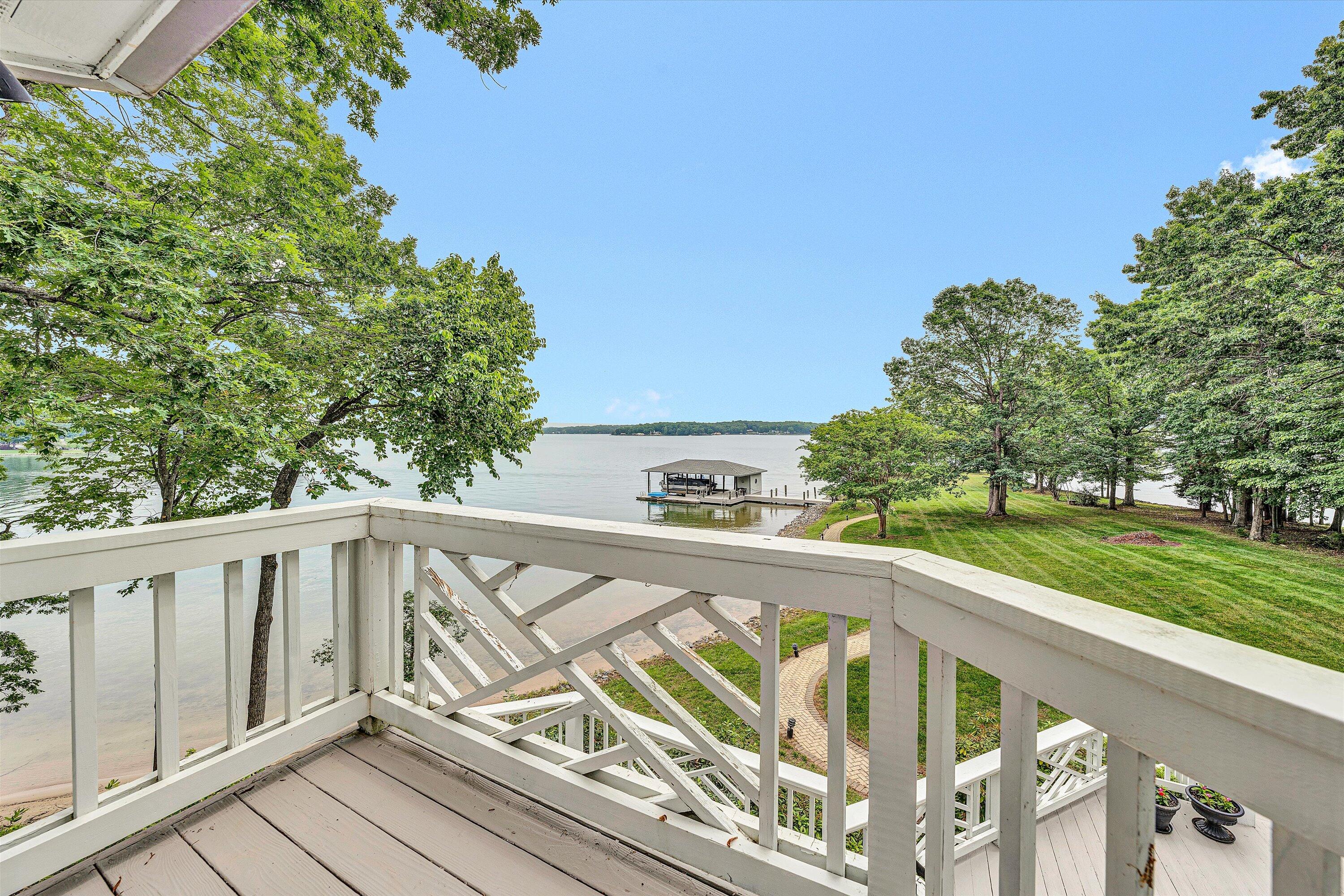 217 Anthony Home Road Huddleston, VA 24104 - Photo 33 of 68 a view of a balcony with wooden floor and fence