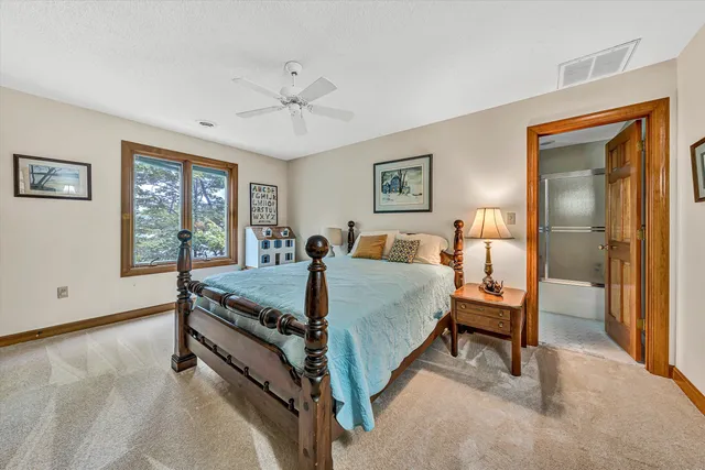 a view of a swimming pool with a yard