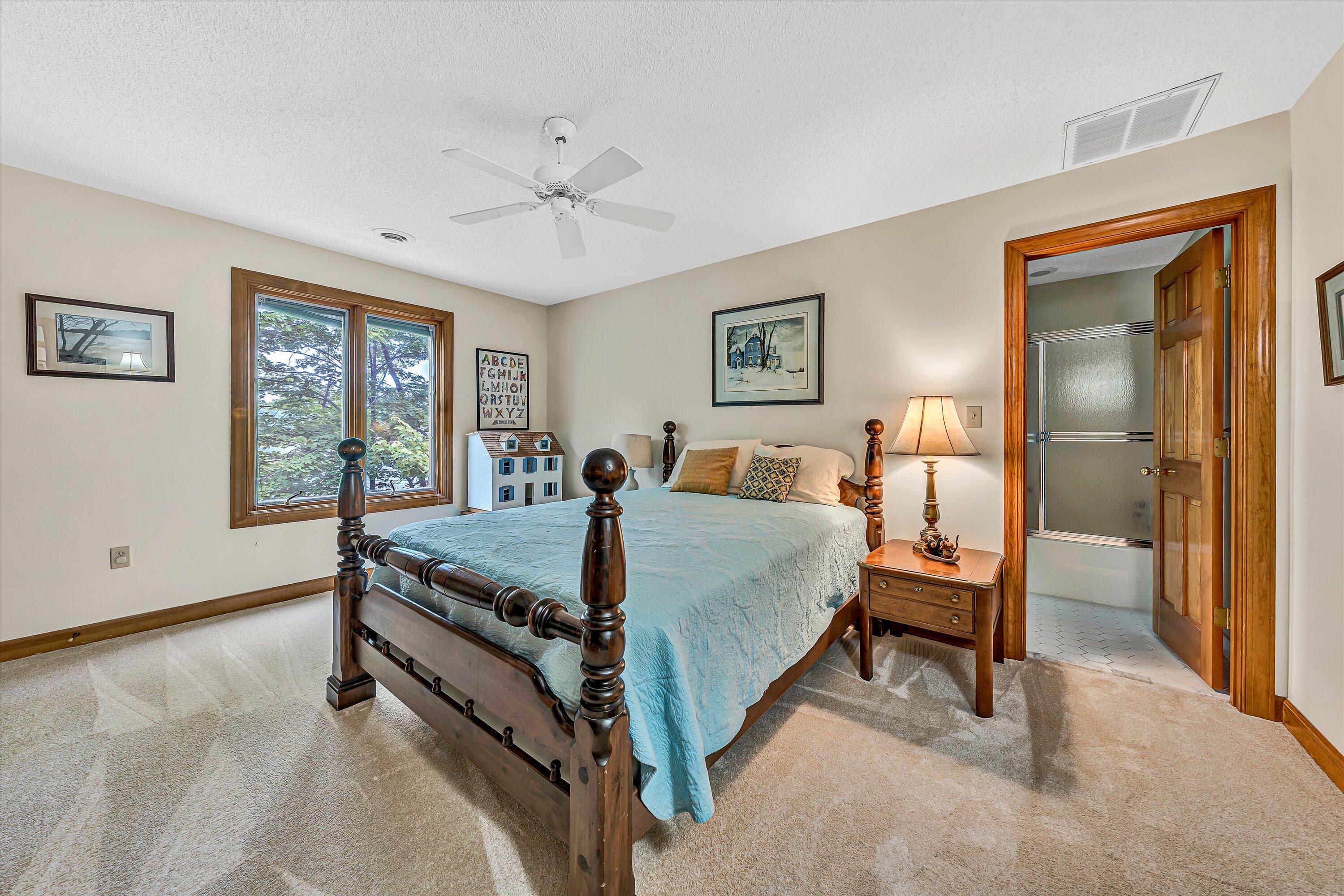 217 Anthony Home Road Huddleston, VA 24104 - Photo 36 of 68 a bed room with a bed and a tv