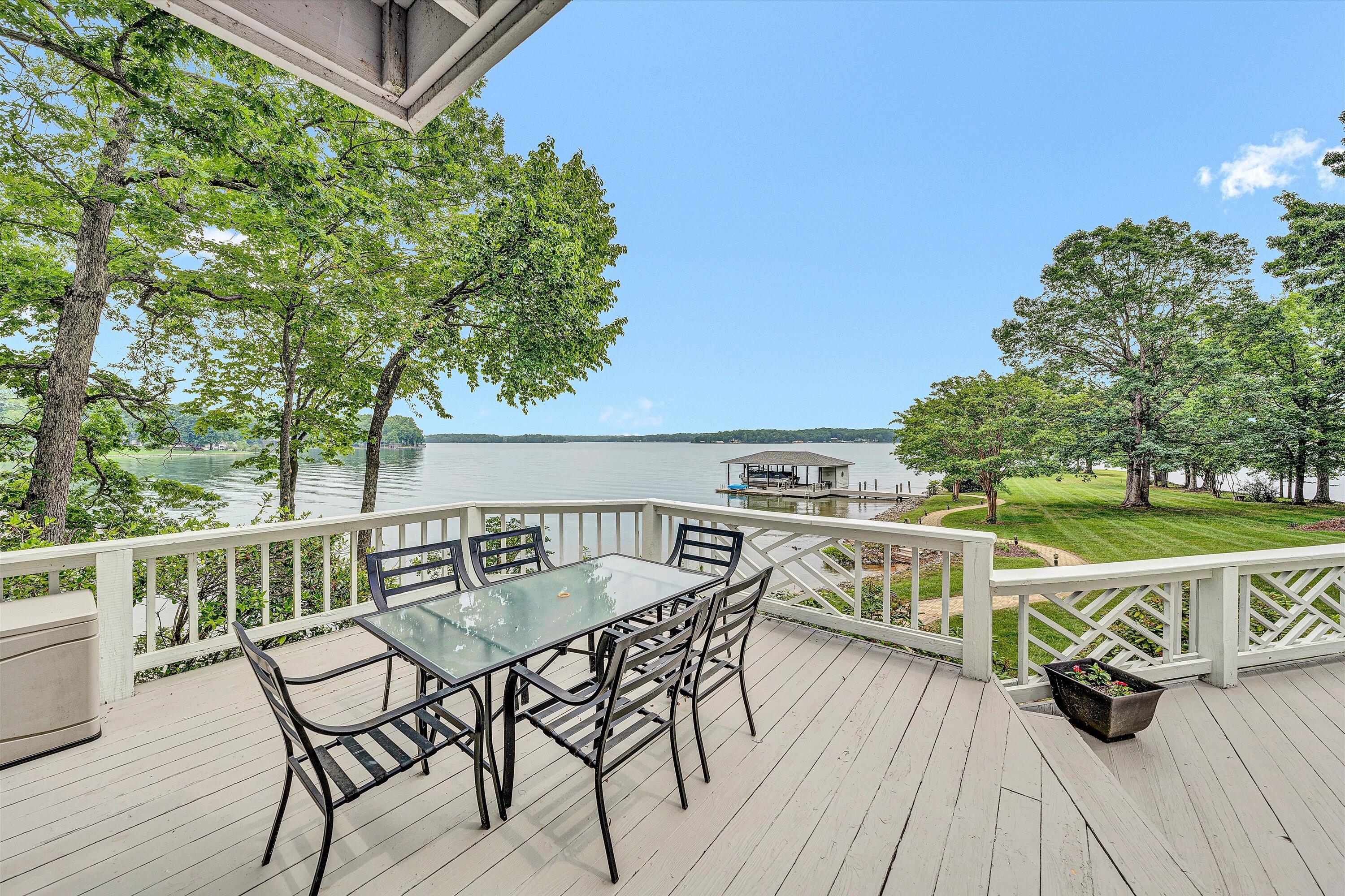 217 Anthony Home Road Huddleston, VA 24104 - Photo 50 of 68 a view of a chairs and table on the deck