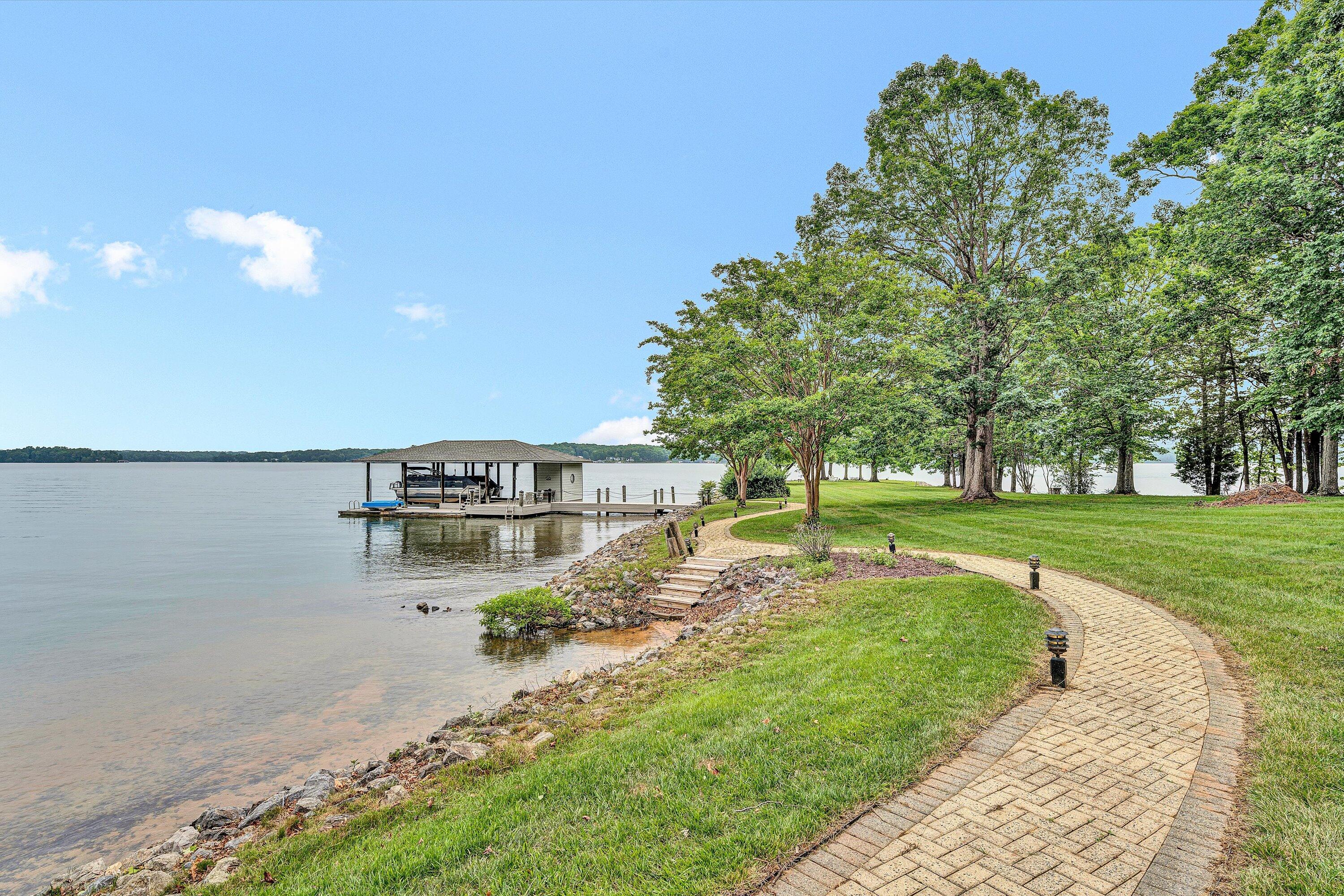 217 Anthony Home Road Huddleston, VA 24104 - Photo 53 of 68 a view of a swimming pool and trees in the background