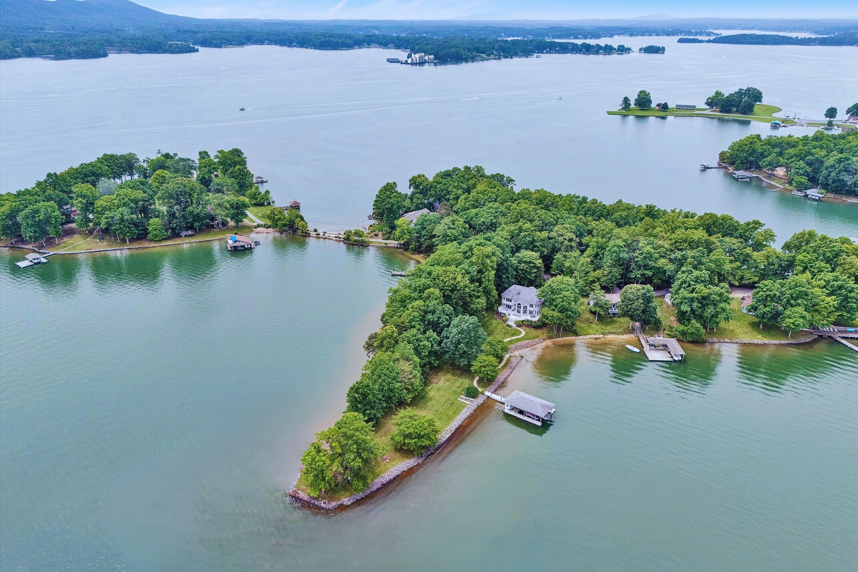217 Anthony Home Road Huddleston, VA 24104 - Photo 6 of 68 an aerial view of a house with a lake view