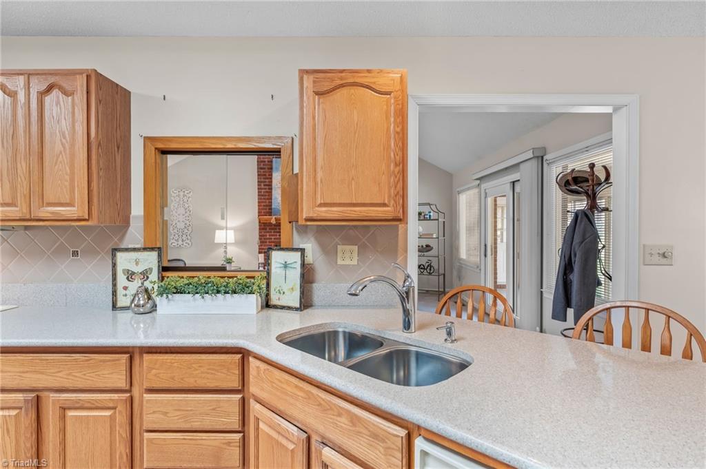 9 Pilot Circle Greensboro, NC 27407 - Photo 11 of 50 So Bright and Airy! Enjoy spring in the fabulous sunroon/screened Porch!