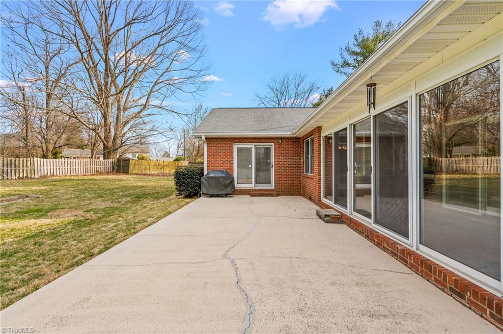 9 Pilot Circle Greensboro, NC 27407 - Photo 39 of 50 What a fabulous space! This shows access to sun room from the back far left bedroom