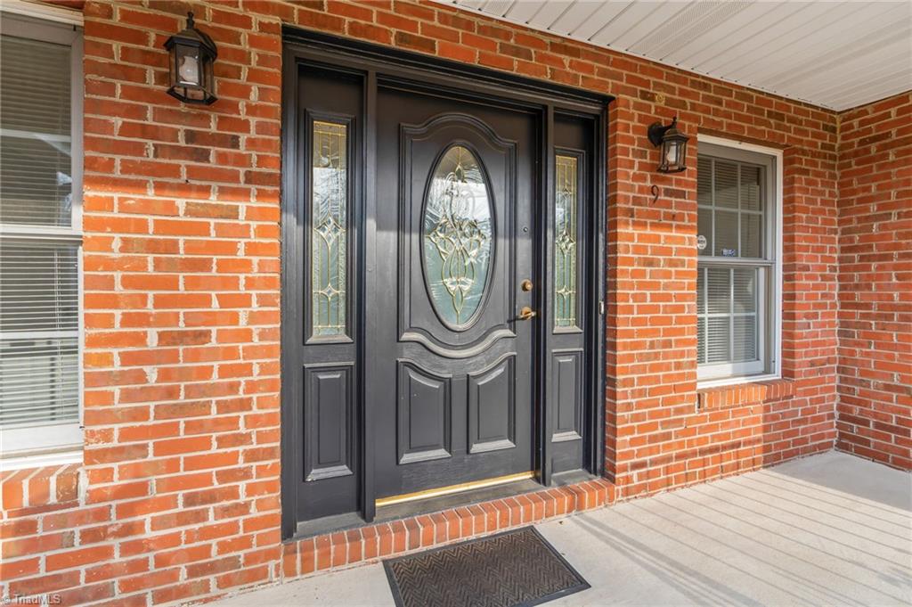 9 Pilot Circle Greensboro, NC 27407 - Photo 4 of 50 Covered front porch beckons you!