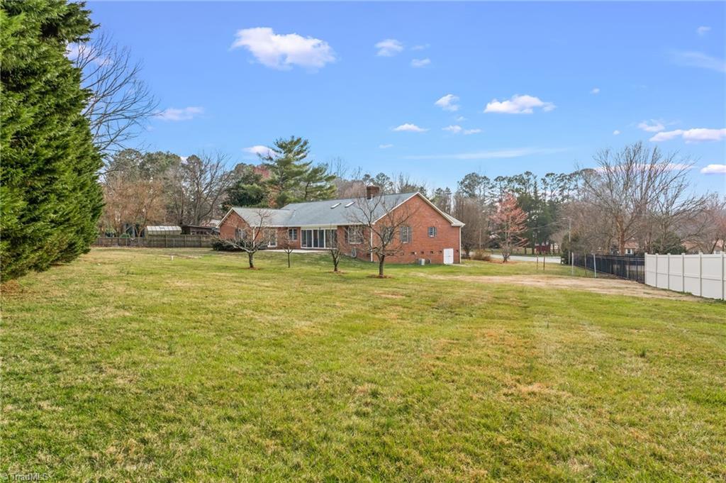9 Pilot Circle Greensboro, NC 27407 - Photo 42 of 50 Back patio with view of Primary bedroom access