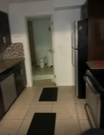 a bathroom with a sink and a shower