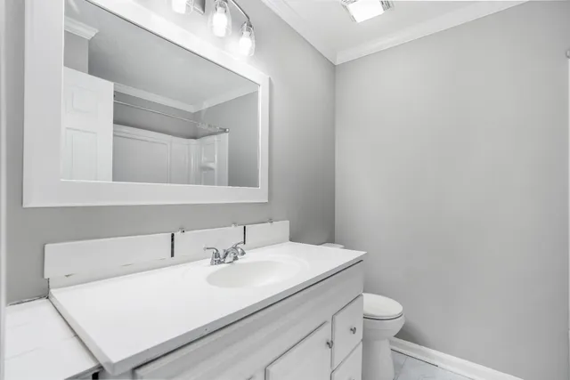 a bathroom with a sink and a toilet