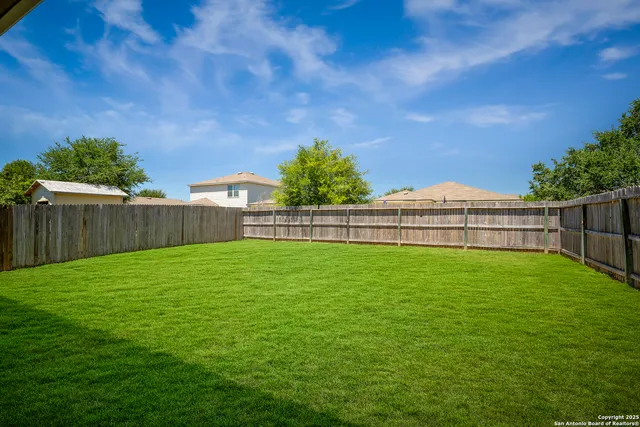 a view of a backyard with a garden