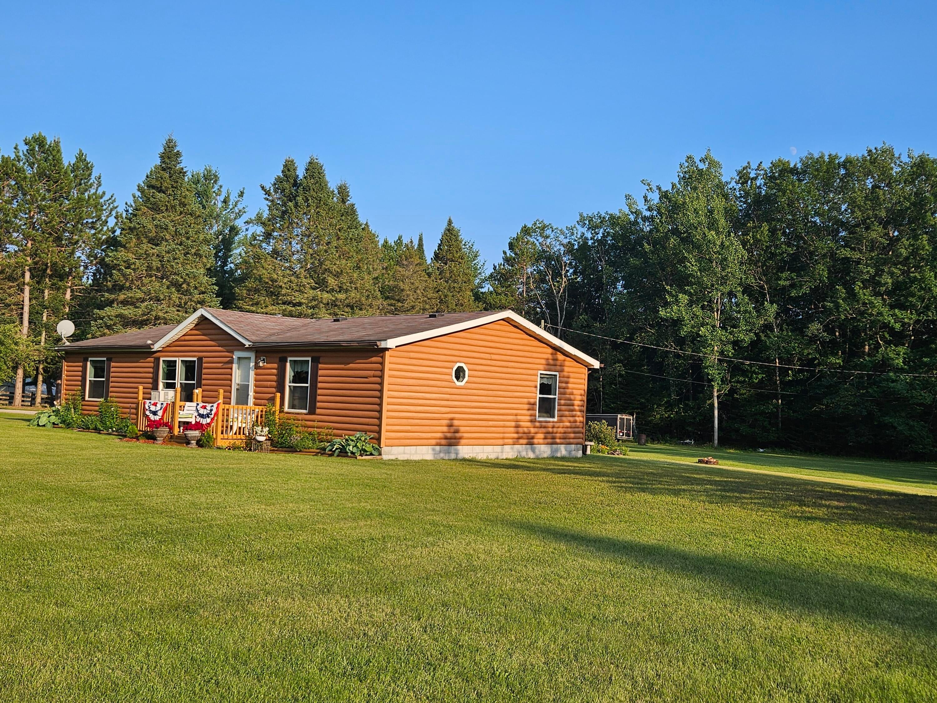 8141 Long Rapids Road Alpena, MI 49707 - Photo 1 of 62