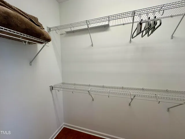 a view of a room with racks on the wall