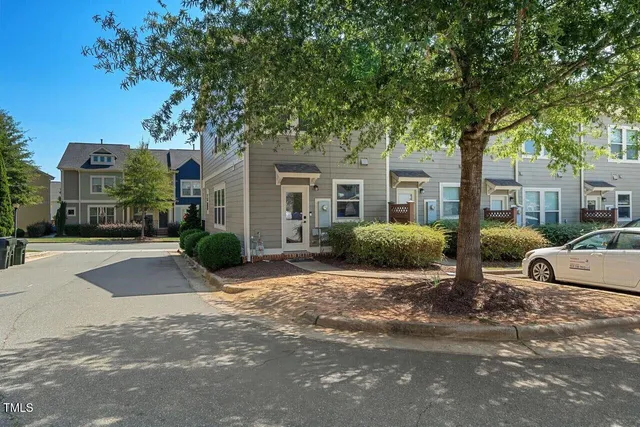 a view of a building with a street