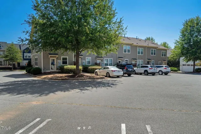 a cars parked in front of a building