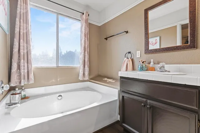a bathroom with a toilet bathtub and shower
