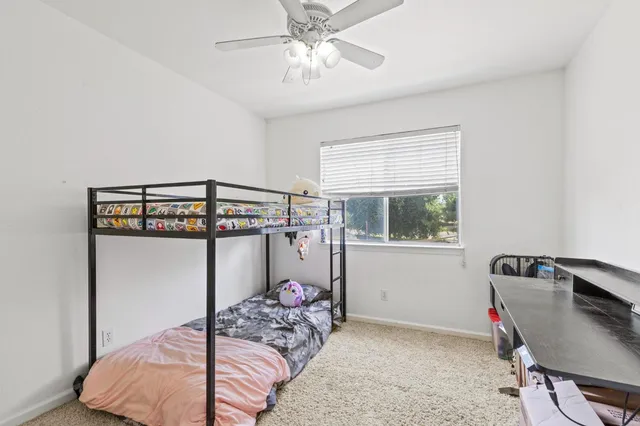 a view of a balcony with wooden floor