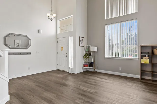 an empty room with windows