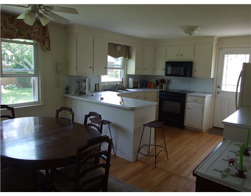 22 Reservoir Avenue Warren, RI 02885 - Photo 4 of 8 Kitchen. The nice large kitchen and dining area sits at the rear of the house.