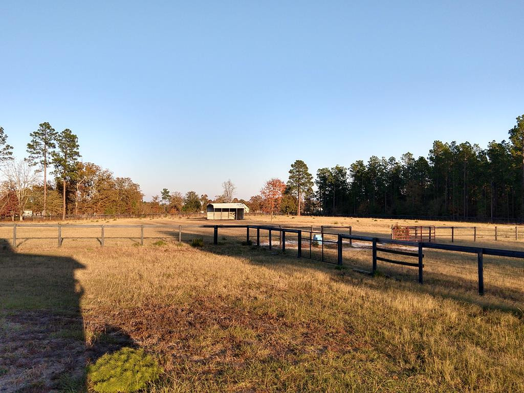 136 Britton Road Windsor, SC 29856 - Photo 55 of 60 a view of a lake with sitting area