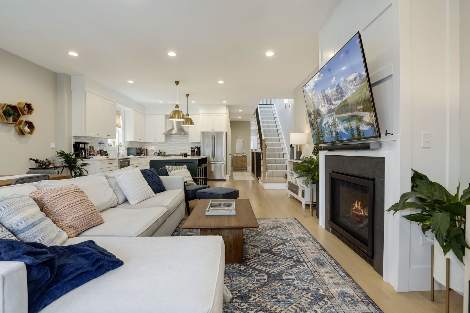 3048 West Lyndale Street, Unit 2 Chicago, IL 60647 - Photo 12 of 40 a living room with furniture and a fireplace